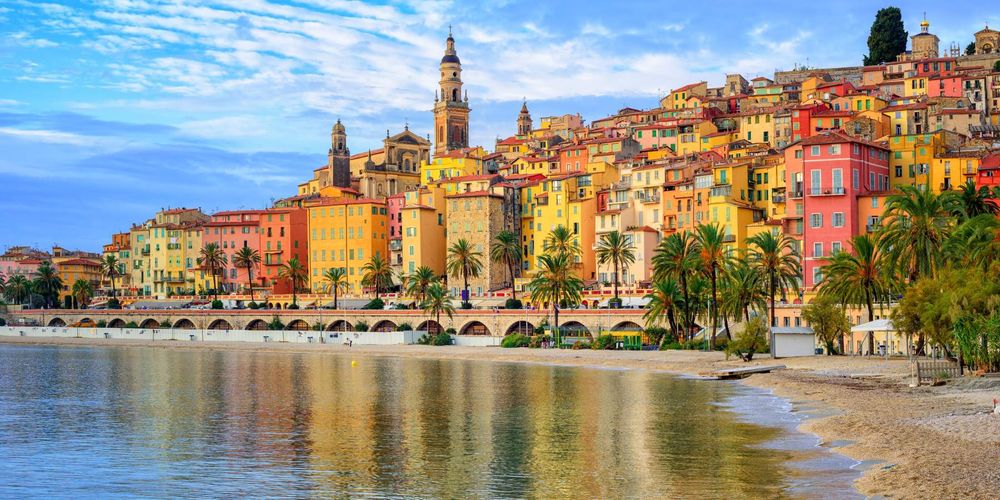 A picturesque view of the French Riviera, where the sparkling Mediterranean waters meet the elegant charm of the Côte d'Azur's iconic destinations.